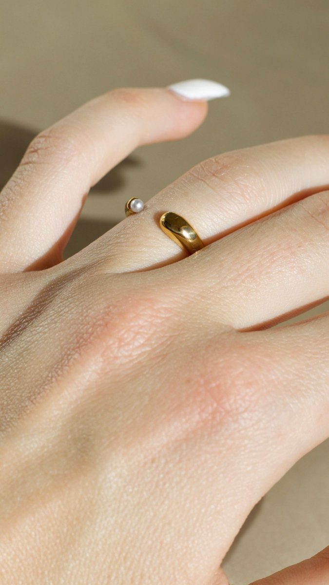 Ana Open Gold Pearl Ring Worn on Model’s Hand - Angle View