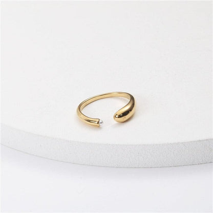 Ana Open Gold Pearl Ring Displayed on White Background Featuring Chunky Asymmetrical Design