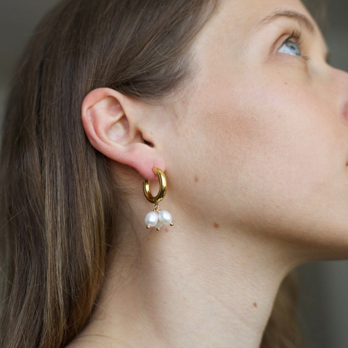 Ceci Gold Hoop Triple Cluster Pearl Earrings Worn by Model Right Ear